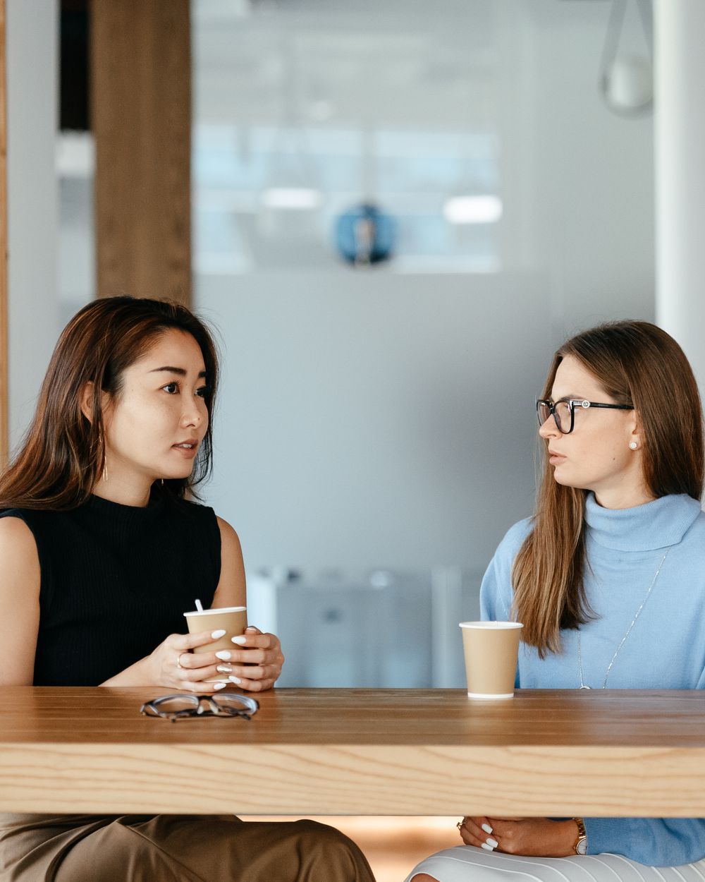 Two people in a warm, supportive conversation